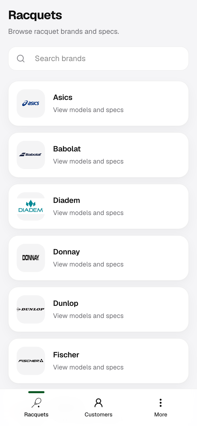 Racquets tab showing brand list.